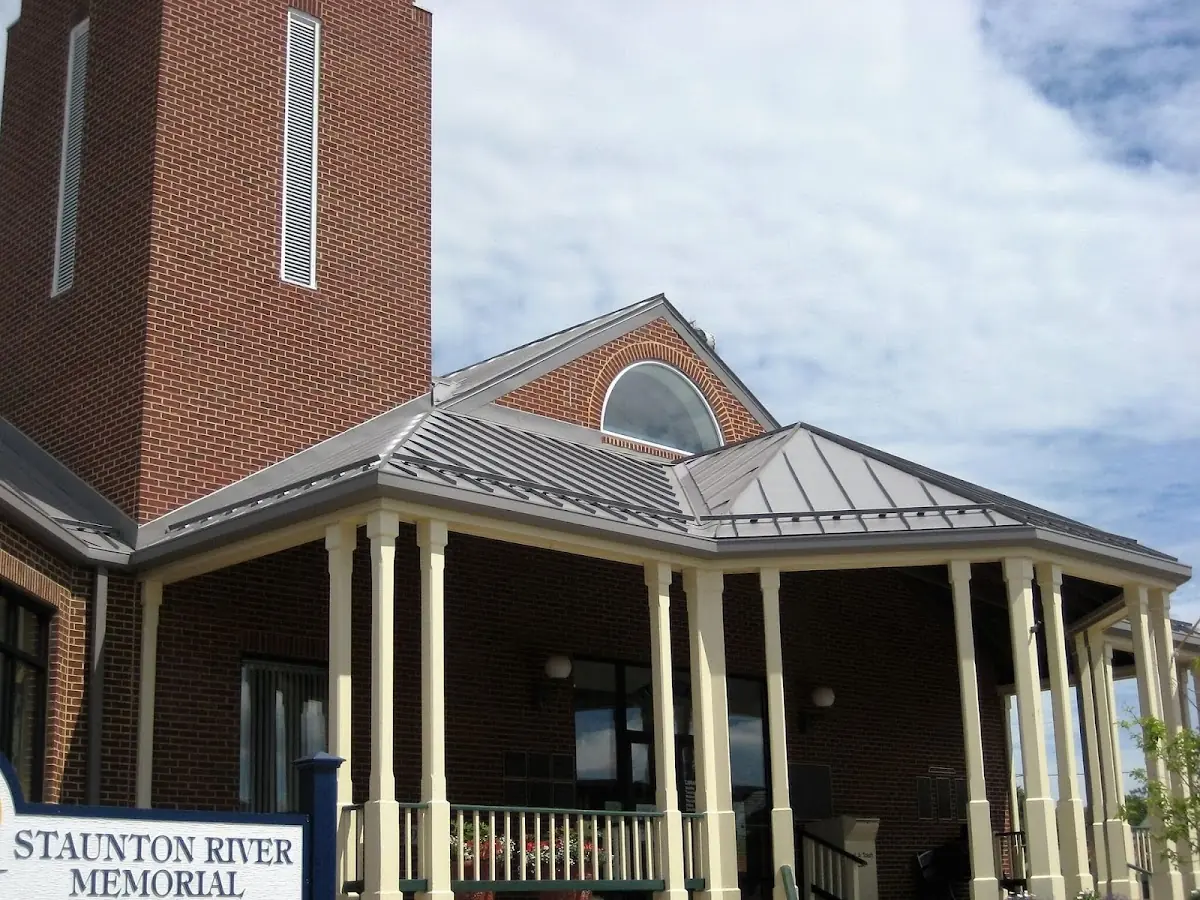 Skilled roofing craftsmen working on a residential roof in Leesville